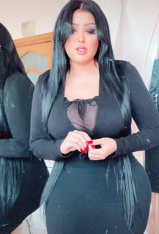 Desirable Salma Elshimy Shows Cleavage in Black Dress