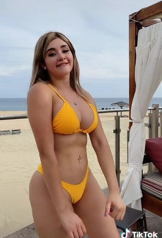 4. Cute Sharon Shirley Shows Cleavage in Yellow Bikini