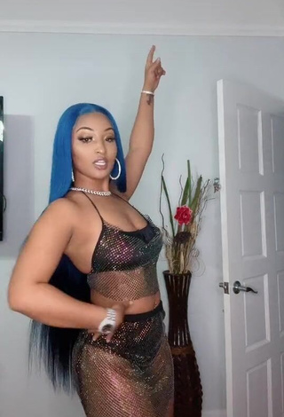 1. Desirable Shenseea Shows Cleavage in Black Crop Top