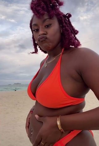 3. Sweetie Skaibeauty Shows Cleavage in Electric Orange Bikini at the Beach