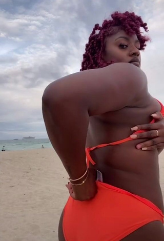 4. Sweetie Skaibeauty Shows Cleavage in Electric Orange Bikini at the Beach