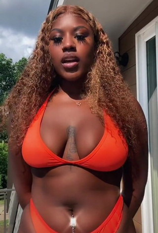 1. Skaibeauty Shows Cleavage in Sweet Orange Bikini