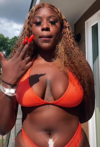 3. Skaibeauty Shows Cleavage in Sweet Orange Bikini