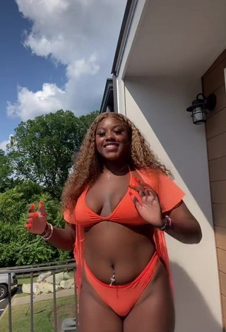 1. Dazzling Skaibeauty Shows Cleavage in Inviting Orange Bikini