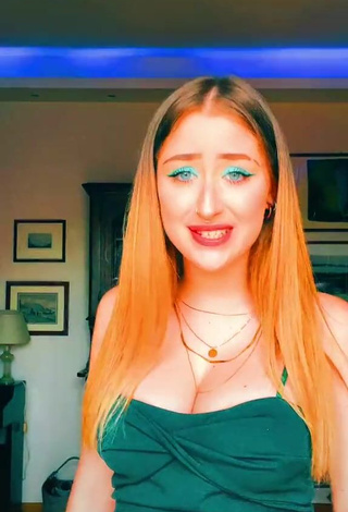 1. Sexy Sofia Sembiante Shows Cleavage in Green Dress and Bouncing Breasts