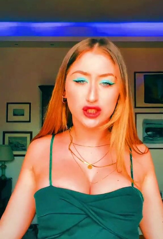 4. Sexy Sofia Sembiante Shows Cleavage in Green Dress and Bouncing Breasts