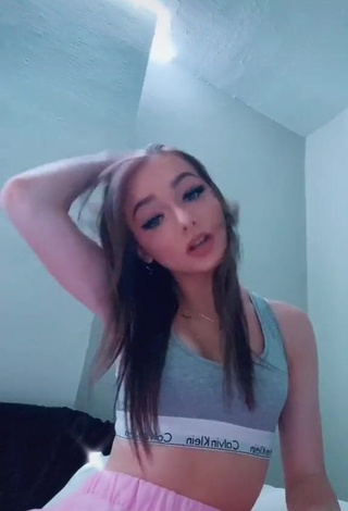 Sexy Zoeigh Lavender Shows Cleavage in Grey Crop Top