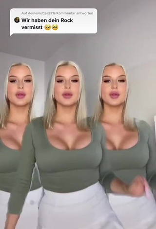 Antonia Rot Shows Cleavage in Erotic Green Crop Top and Bouncing Big Boobs