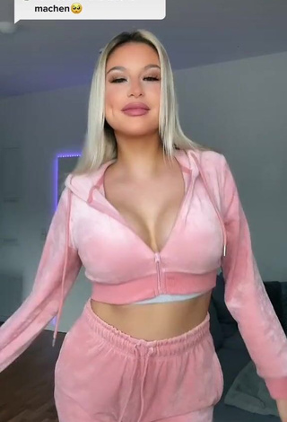 1. Attractive Antonia Rot Shows Cleavage in Pink Crop Top