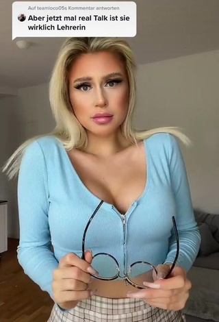 1. Antonia Rot Shows Sexy Blue Crop Top and Cleavage