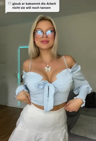 Antonia Rot Shows Cleavage in Hot Blue Crop Top