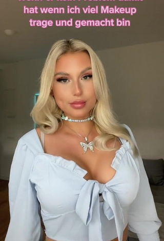 Antonia Rot Shows Cleavage in Sweet Blue Crop Top