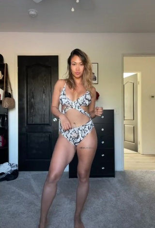 1. Desirable Atqofficial Shows Cleavage in Snake Print Swimsuit