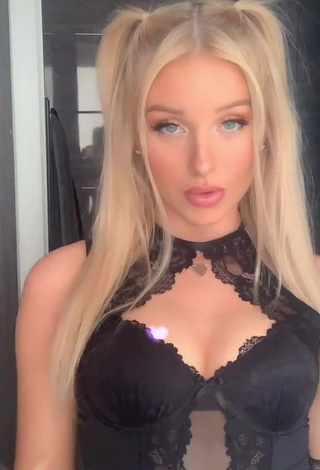 1. Sexy Charlotte Parkes Shows Cleavage in Black Bodysuit