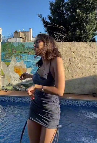 1. Hot Dai Amadeo Shows Cleavage in Grey Dress at the Swimming Pool