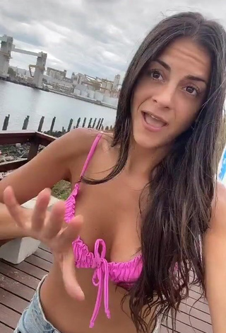 1. Desirable Emily Lucius Shows Cleavage in Pink Bikini Top