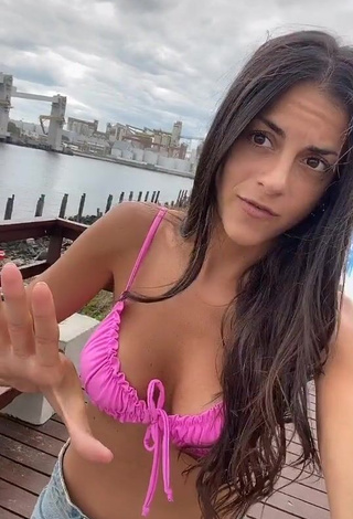 Desirable Emily Lucius Shows Cleavage in Pink Bikini Top