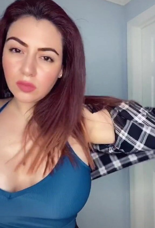 Pretty Jane Rocci Shows Cleavage in Blue Crop Top