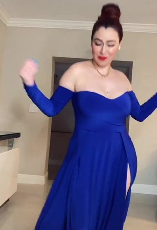 Alluring Jane Rocci Shows Cleavage in Erotic Blue Dress