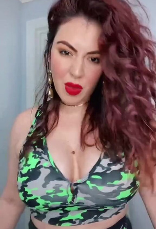 3. Alluring Jane Rocci Shows Cleavage in Erotic Camouflage Crop Top and Bouncing Big Boobs