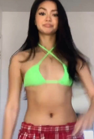 4. Desirable Kailey Amora Shows Cleavage in Light Green Bikini Top