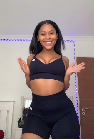 3. Gorgeous Lluvia Faye Shows Cleavage in Alluring Black Crop Top