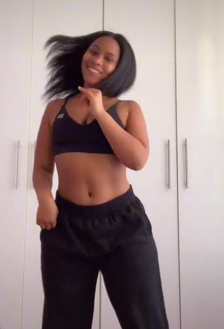 Sexy Lluvia Faye Shows Cleavage in Black Crop Top