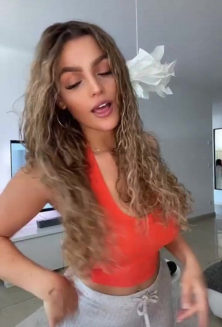 1. Amazing Jeje Lopes Shows Cleavage in Hot Orange Crop Top