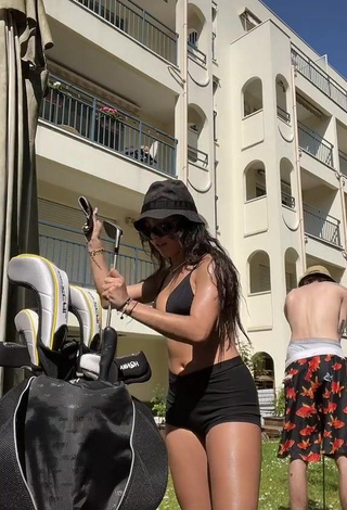 Sexy Mai Lee Shows Cleavage in Black Bikini Top