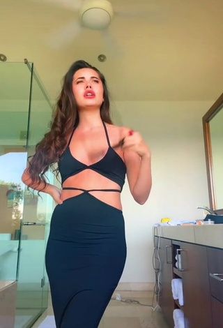 Hot Morgan Cohen Shows Cleavage in Black Crop Top