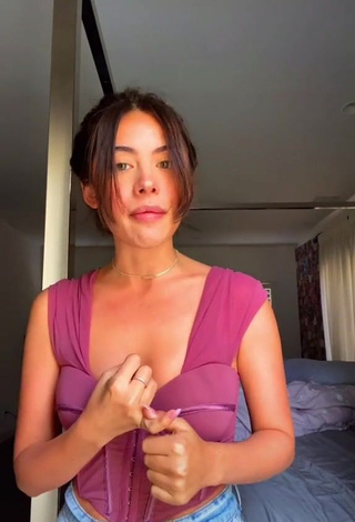 Beautiful Morgan Cohen Shows Cleavage in Sexy Purple Crop Top