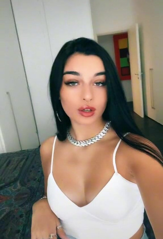 Sweetie Sofia Crisafulli Shows Cleavage in White Crop Top