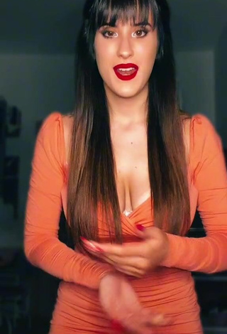 Adorable Alice Iori Shows Cleavage in Seductive Orange Dress