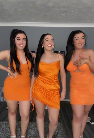 1. Hot Terrytriplets Shows Cleavage in Orange Dress and Bouncing Breasts