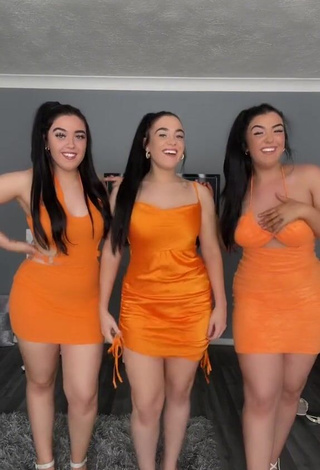 Hot Terrytriplets Shows Cleavage in Orange Dress and Bouncing Breasts