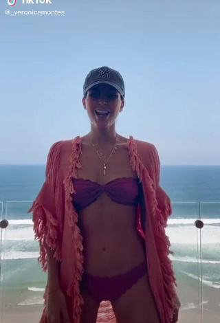 Desirable Verónica Montes Shows Cleavage in Purple Bikini