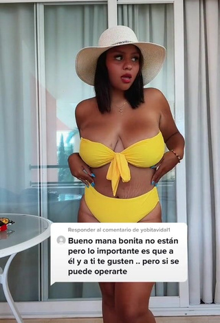 1. Cute Adelaida Tassoni Shows Cleavage in Yellow Bikini