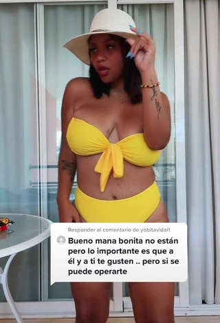 Cute Adelaida Tassoni Shows Cleavage in Yellow Bikini