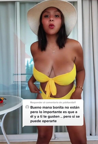 3. Cute Adelaida Tassoni Shows Cleavage in Yellow Bikini