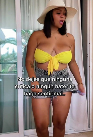 1. Hot Adelaida Tassoni Shows Cleavage in Yellow Bikini Top and Bouncing Big Tits