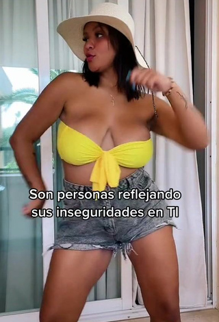 3. Hot Adelaida Tassoni Shows Cleavage in Yellow Bikini Top and Bouncing Big Tits