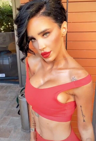 3. Hot Adelina Ioana Pestritu Shows Cleavage in Red Crop Top