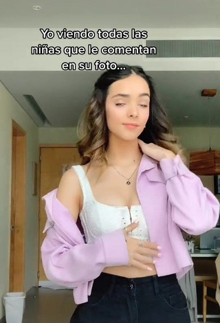 3. Sweetie Alana Lliteras Shows Cleavage in White Crop Top