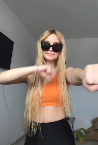 3. Pretty Alexa Shows Cleavage in Orange Crop Top