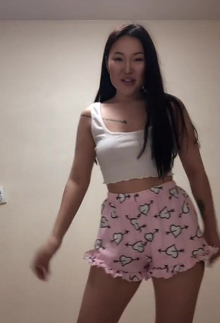 Sexy Arzhaana Shows Cleavage in White Crop Top