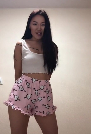 3. Sexy Arzhaana Shows Cleavage in White Crop Top