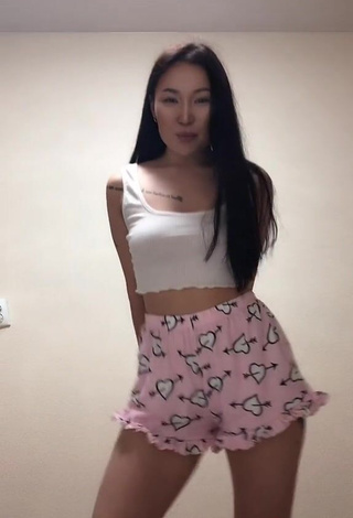 4. Sexy Arzhaana Shows Cleavage in White Crop Top