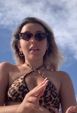 4. Gorgeous Beatrice Cossu Shows Cleavage in Alluring Leopard Bikini Top