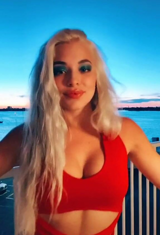 4. Fine Bella Martinez Shows Cleavage in Sweet Red Crop Top on the Balcony