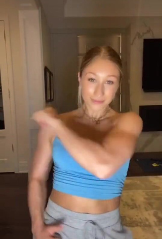 Cute Briar Nolet Shows Cleavage in Blue Crop Top